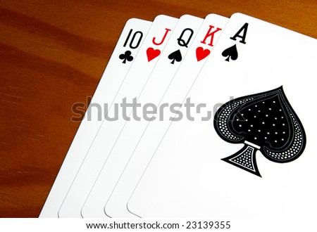 A good set of playing cards with the ace of spades in the front