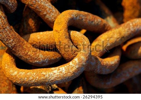 Old industrial chain links in at a fishing harbor