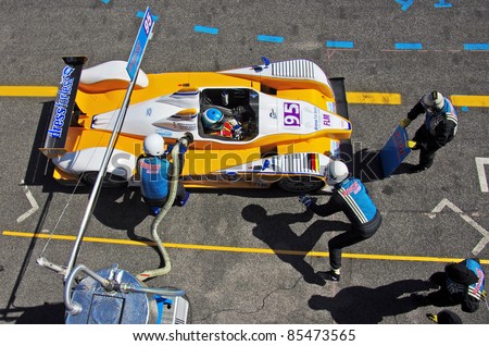 ESTORIL - SEPTEMBER 25: The FLM Oreca 09 of the Pegasus Racing Team, stops in the pit-lane for refueling in the LMS race \