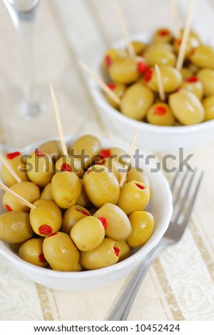 green olives, stuffed with red peppers