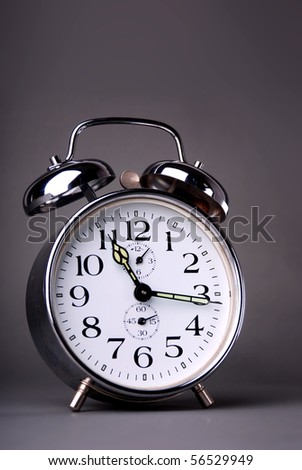 Alarm clock on dark background