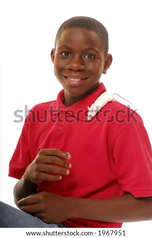 stock photo Preteen boy with tiny pet isolated on white