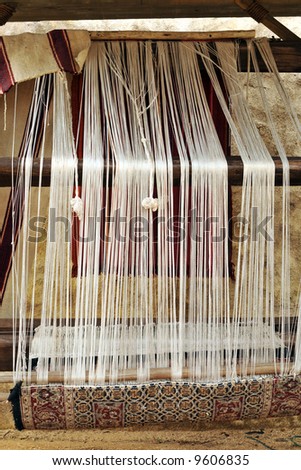 Ancient rug weaving-loom.