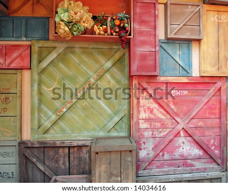 A background arrangement of colorful, old shipping crates.