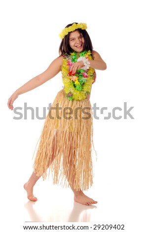 stock photo A pretty preteen girl dancing barefoot in a grass skirt and 