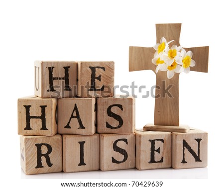 A wooden cross with the words 