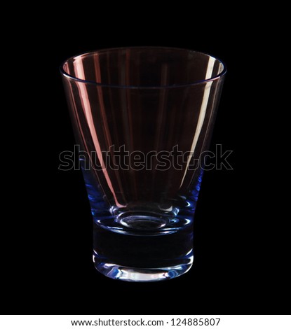 transparent glass on the black background. red and green flare on the glass. glass blue.
