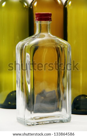some empty glass bottles from under the wine and spirits.