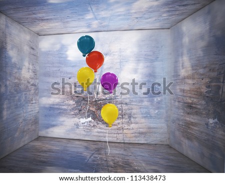 Fantasy box inside with sky and clouds on the walls and wooden texture with five colorful balloons that flying inside of it