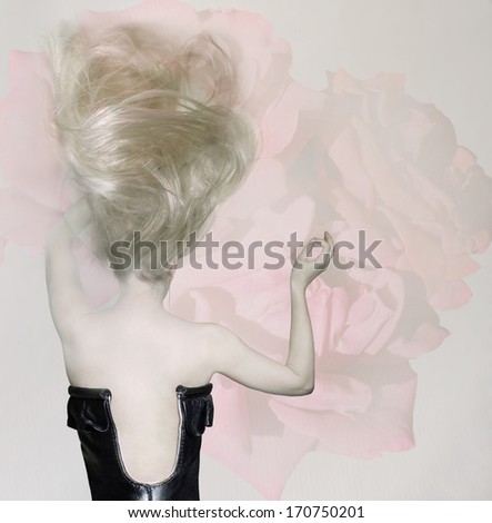 Sensual and sophisticated back of a female model with leather bodice long blond hair and pink roses