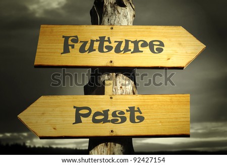 Two directional arrows that indicate the past and the future with a dramatic sky