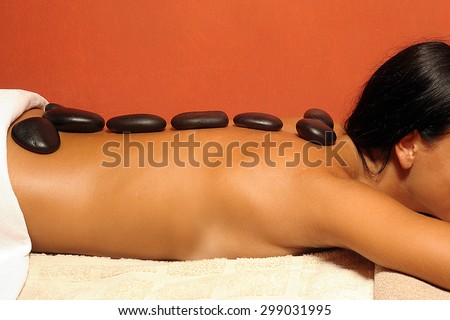 Hot stone massage in spa salon