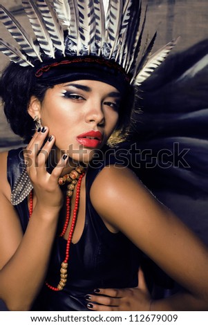 Young Pretty Woman With Make Up Like Red Indian Stock Photo 112679009