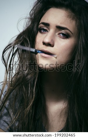 young depressed woman drug addict close up