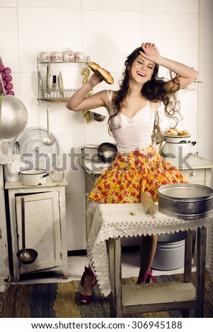 crazy real woman housewife on kitchen, eating perfoming