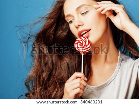 young pretty adorable woman with candy close up like doll makeup