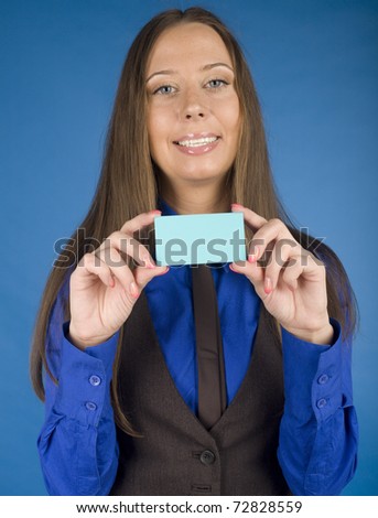 portrait of pretty young woman with visit card, empty space for text