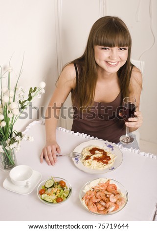 stock photo of pretty young woman in restaurant