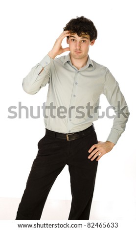 Portrait of smiling young man wishing you good luck over white background