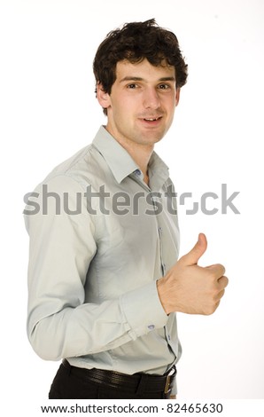 Portrait of smiling young man wishing you good luck over white background