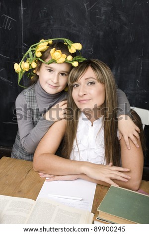 portrait of pretty woman with daughter hugging