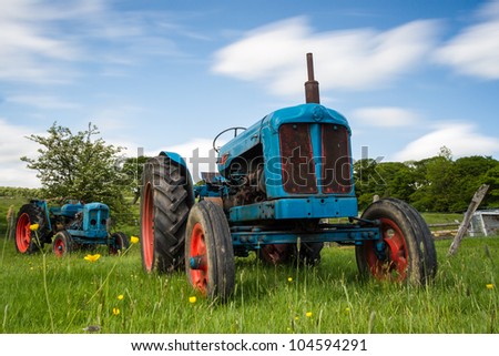 Out to grass - A brightly coloured vintage tractor