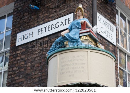 YORK, UK - DECEMBER 29TH 2013: Street sign for High Petergate and Minster Gates and Minerva in York, on 29th December 2013.