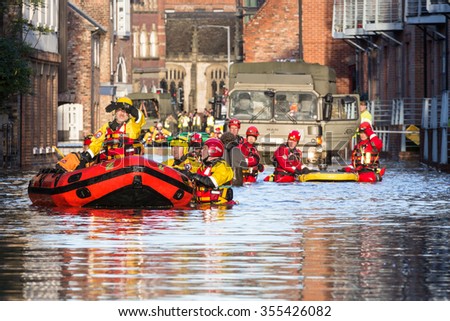 YORK, UK - DECEMBER 27th 2015: Flood rescue by the British Army and the Mountain Rescue at Queens Staith Road near the Ouse Bridge in York City Centre after heavy rain, on 27th December  2015.