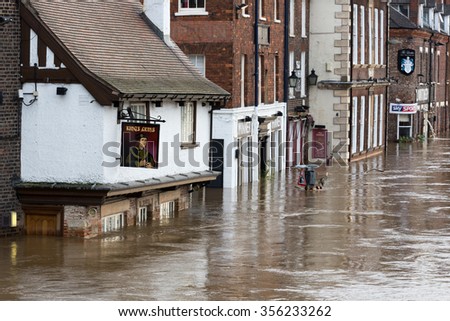 YORK, UK - DECEMBER 28th 2015: Flooded streets at King\'s Staith in York City Centre after heavy rain, on 28th December  2015.