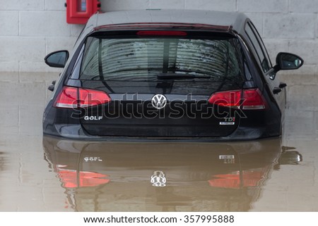 YORK, UK - DECEMBER 28th 2015: Flooded streets of York City Centre and a submerged car after heavy rain, on 28th December  2015,