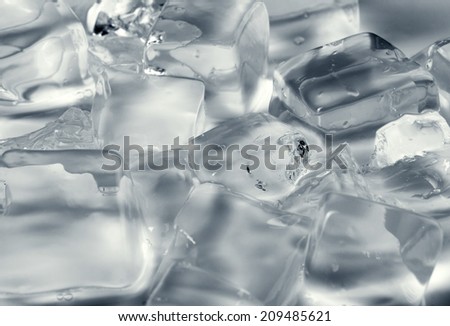close up of grey-light ice cubes, ice background