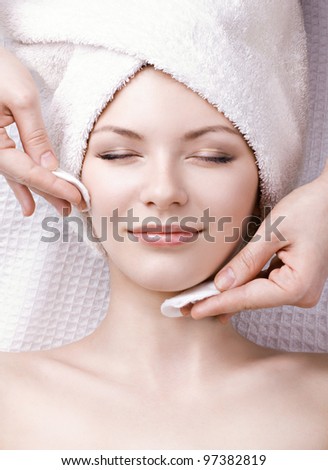 beautiful woman enjoying facial massage