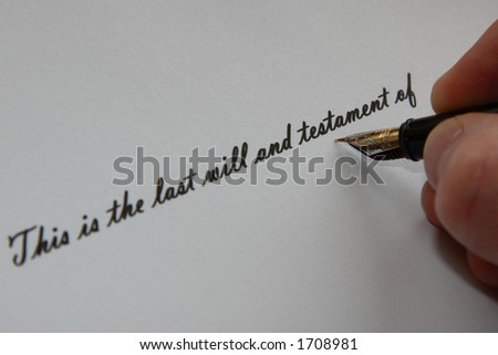 Handwritten \'This is the last will and testament of\' with hand holding fountain pen