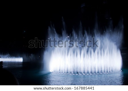 DUBAI, UAE - MAY 23: A record-setting fountain system set on Burj Khalifa Lake on May 23, 2011. Illuminated by 6600 lights and 25 projectors, it shoots water 150 m into the air.