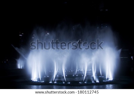 DUBAI, UAE - MAY 23: A record-setting fountain system set on Burj Khalifa Lake on May 23, 2011. Illuminated by 6600 lights and 25 projectors, it shoots water 150 m into the air.