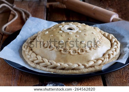 Traditional Russian pie Kournik before baking