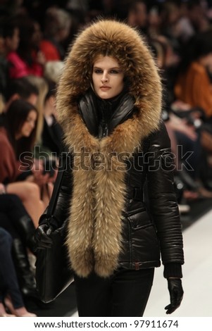 TORONTO - MARCH 15: A model walks the runway in the Rudsak runway show for the Fall/Winter 2012 season at Toronto\'s World Mastercard Fashion Week on March 15. 2012 in Toronto, Canada...