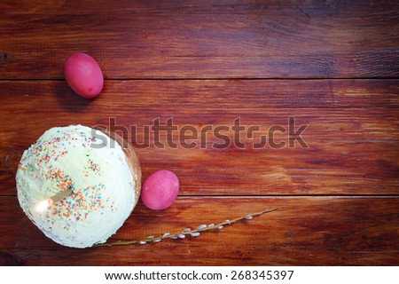 Composition about Orthodox Christian Easter with red eggs and a cake