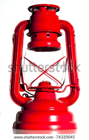Bright red storm lamp isolated against a white background