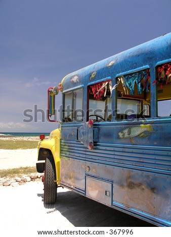 A colorful bus parking on the beach...