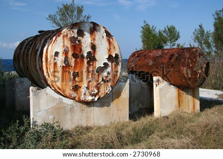 Two vintage and rusty water tanks