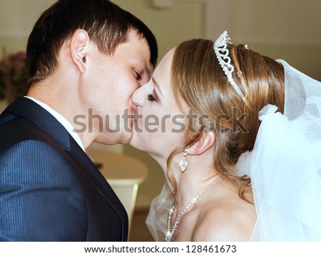 groom kisses the bride