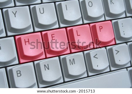 Computer keyboard with the word HELP spelt on the keys in red