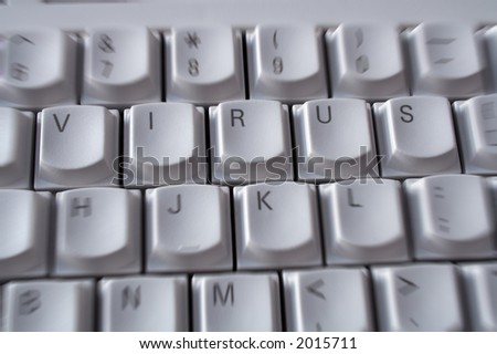 The word virus spelt on computer keyboard with a urgent/emergency zoom effect