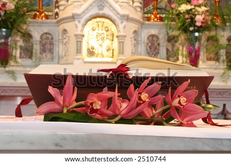 stock photo Bible in Catholic Church on altar at wedding or funeral 