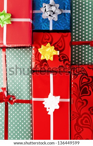 various colorful gift packages with colorful ribbons
