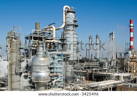 The industrial scale of an oil refinery and its systems