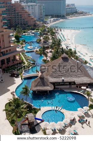 Mexican Caribbean Resort Hotel in the tropics with swimming pools, beach, and the ocean