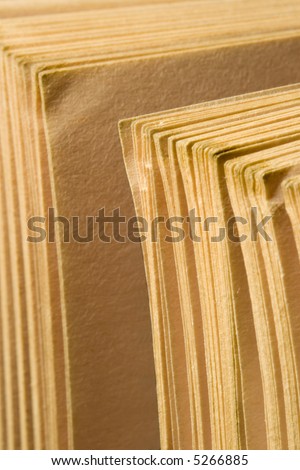 Closeup of weathered and yellowed book pages from an old library