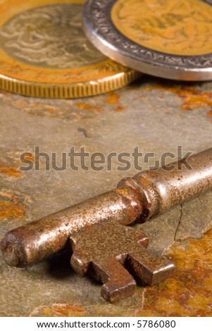 Old skeleton type keys on a solid slate stone foundation